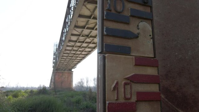 hydrometer is the instrument that detects the hydrometric altitudes, that is, the level of water, rivers or lakes - drought and scarcity of water in the Po river in Pavia Lombardy 