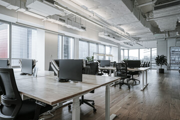Interior of modern empty office building.Open ceiling design.