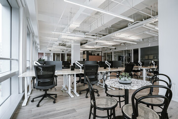 Interior of modern empty office building.Open ceiling design.