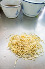 Egg noodles are about to be boiled to make noodles.