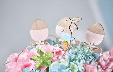 Figures of a hare and eggs made of wood for Easter decoration