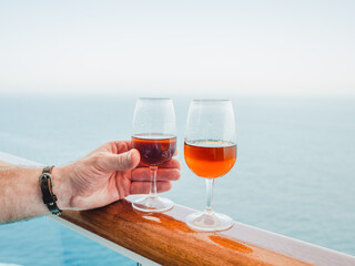 Beautiful glass with a drink. Side view, close-up. Vacation and travel concept. Moments of celebration