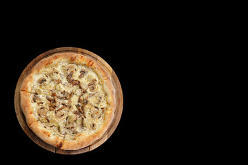 Pizza with mushrooms and chicken on a black background, isolate