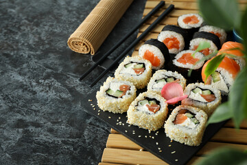 Concept of tasty food with sushi, space for text