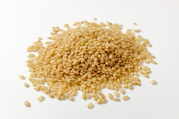 brown rice on a white background