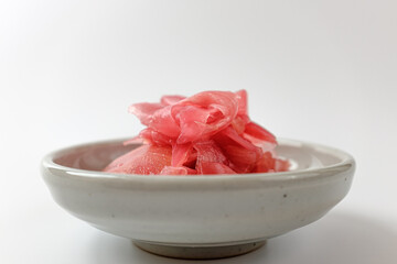 Pickled ginger on a white background