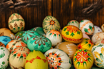Happy Easter.Colorful hand painted decorated Easter eggs. Handmade Easter craft.Spring decoration background. Festive tradition for Eastern European countries.Holiday Still life photo selective focus