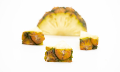 Sliced and half of Pineapple(Ananas comosus) on white background