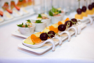 Fruit snacks on the buffet table. The food for the party is healthy vegetable.