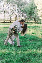 Full body profile photo of two stylish trendy fancy people couple guy and lady slow dance bending back holding hands desire bride and fiance wear luxury formalwear suit mini dress loft indoors
