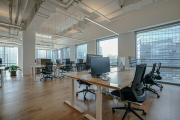 Interior of modern empty office building.Open ceiling design.