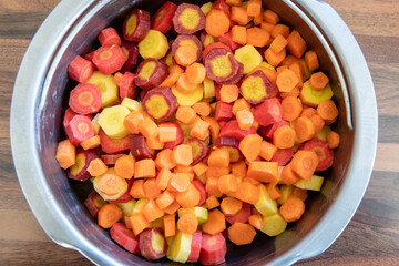 Varieties of carrots cut in an aluminum dish
