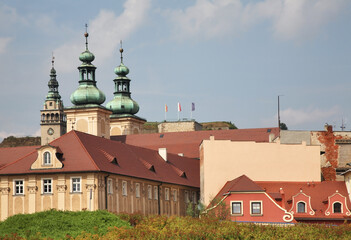 Tower of townhouse and Franciscan monastery in Klodzko. Poland - obrazy, fototapety, plakaty