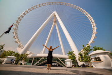 The woman threw up her hands in delight at the sight Ain (Eye) DUBAI - One of the largest Ferris...