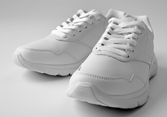 Sport trainers for jogging on white background closeup