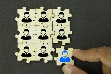 hexagon with an old employee icon and a new employee. the concept of workers or HR