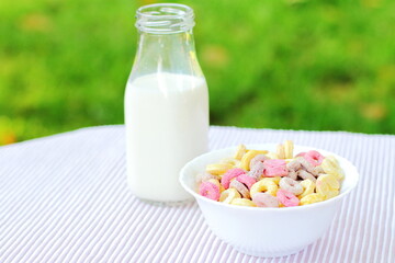 Bowls with different sorts of breakfast cereal products, white bowls with morning meal