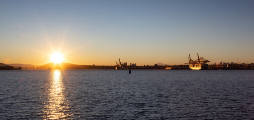 Naklejka premium Vancouver Harbour Panoramic View. Industrial Port with Ships. Sunny Winter Sunrise. British Columbia, Canada.