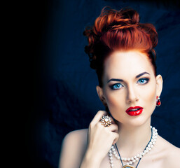 beauty rich woman with bright makeup wearing luxury jewellery on black background, fashion lady