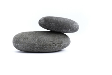 Two large shaped stones on a white background.