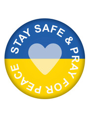 message Stay Safe and Pray for peace on button with Ukrainian flag