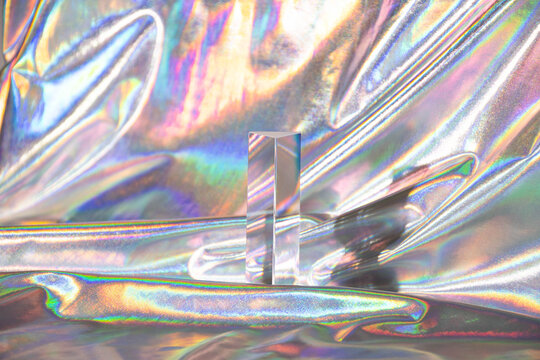 cyber punk still life abstract holographic iridescent fabric with prism