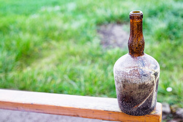 vintage bottle, glass bottle for wine empty dirty kitchenware copy space food background rustic top...