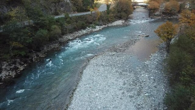 Panoramic view of the rapids of the river flowing into Lake Ritsa
