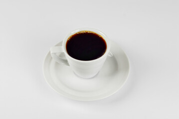 Ceramic coffee mug close up. Coffee isolated on a white background. Copy space and free space for text near the drink.