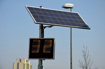 radar to measure the speed of vehicles in the city. A reflective green sign on a pole with LED light numbers informs car drivers how fast they are going. speeding is punishable by a fine a revocation