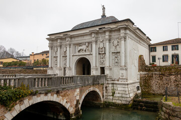 Fototapeta na wymiar Porta San Tommaso, imposing marble entrance door to the city of Treviso