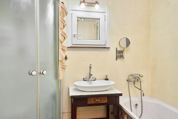 Photos of bathroom with shower and bathtub 