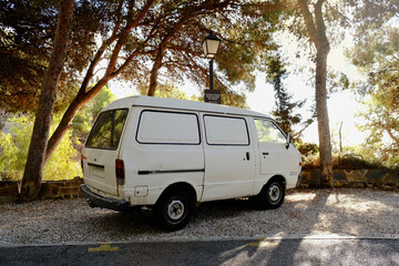 Fototapeta na wymiar Van in the middle of the forest in Malaga