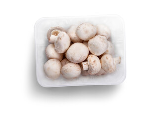 A top view of a punnet of Champignon, white button mushrooms isolated against a white background.