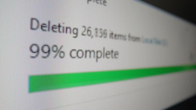 Pixelated loading bar of deleting files on a computer screen