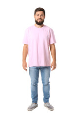 Fototapeta premium Handsome man in pink t-shirt on white background