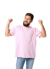 Fototapeta premium Happy young man in pink t-shirt on white background
