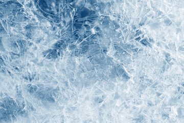 Ice background texture. Frozen water in various geometric abstract shapes. Seasonal natural effect. Cold weather. The surface of the winter water reservoir. - obrazy, fototapety, plakaty