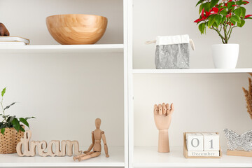 Shelf unit with beautiful decor in room
