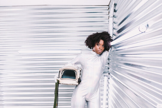 Black woman in astronaut costume