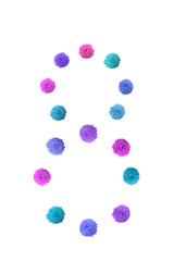 Multicolored flowers laid out in figure eight shape.