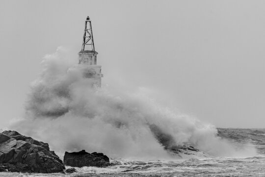 Big storm near an old lighthouse in Achtopol bay, Black sea, Bulgaria