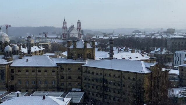 Snowing in Vilnius city center. Lukiškės Prison
