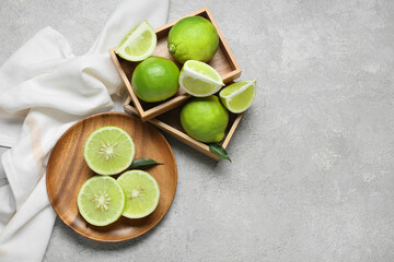 Composition with juicy bergamot fruits on light background - obrazy, fototapety, plakaty