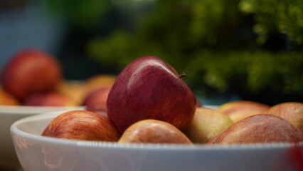 Red Apples on the Plate Close Up