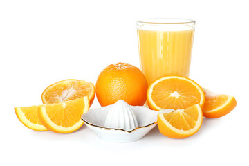 Ceramic juicer, glass of juice and oranges on white background