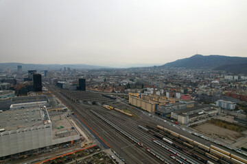 Aerial view of City of Zürich with track field at railway station Zürich Altstetten on a cloudy spring day. Photo taken March 16th, 2022, Zurich, Switzerland.