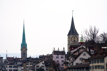 Fototapeta na wymiar Old town of Zürich with protestant church and historic houses at City of Zürich on a cloudy spring day. Photo taken March 21st, 2022, Zurich, Switzerland.