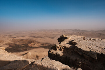 Beautiful view of Makhtesh Ramon desert with cliffs on the background of the sky in Mitzpe, Israel