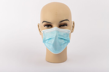 Doctor mask standing on a white background and used for protection against corona virus